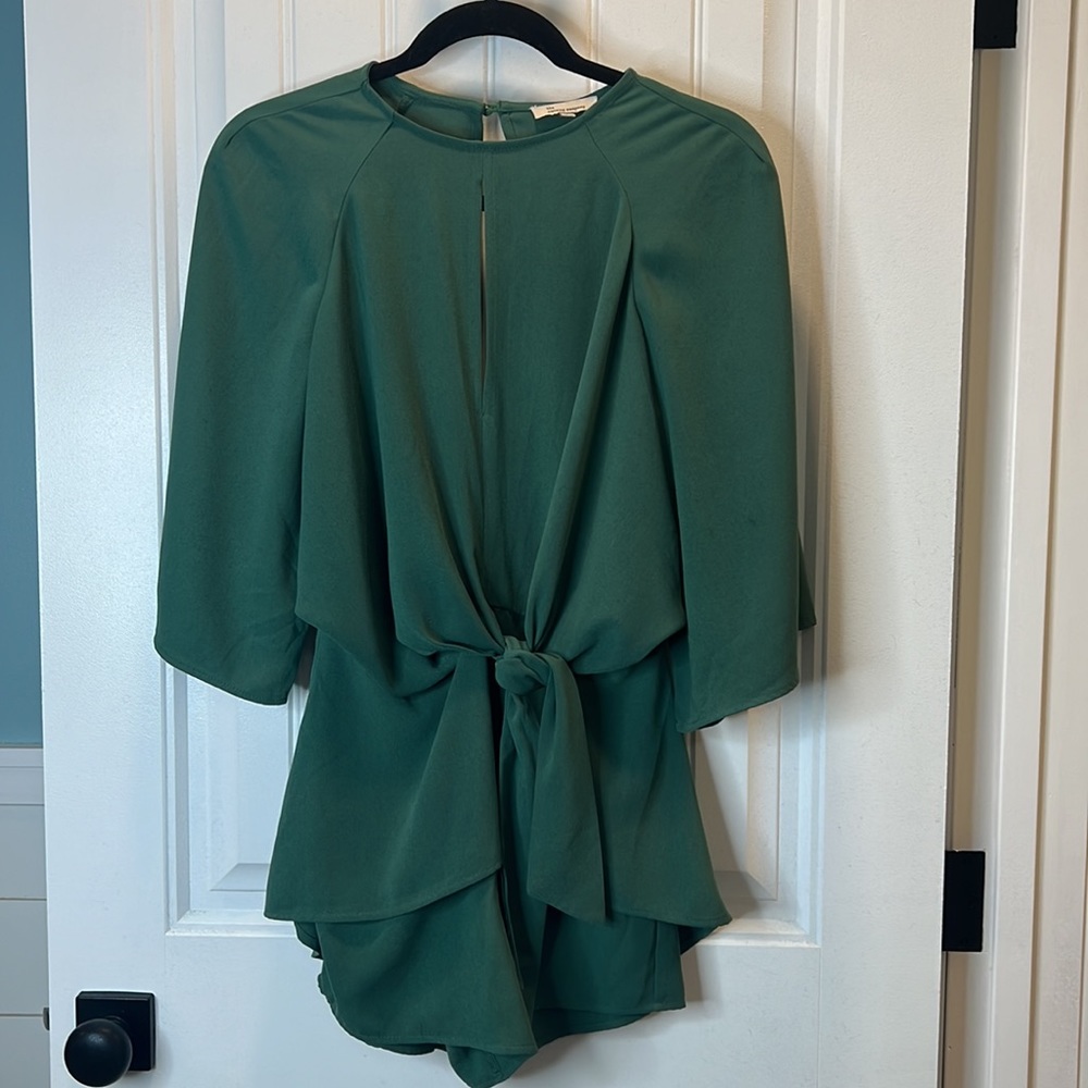 The Clothing Store Green Open Back Long Sleeved Romper. Size Small.